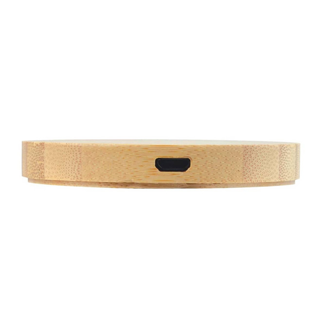 A round bamboo wireless charger with a sleek, natural finish and a black charging port on the side.