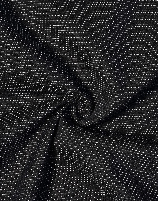 A black fabric with a pin dot pattern, featuring a soft stretch texture.