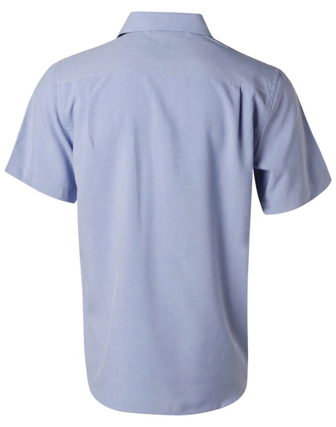 A light blue short sleeve shirt with a standard collar and a logo on the back.