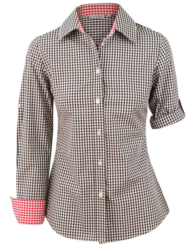 A women's long-sleeve button-up shirt in black and white gingham check with red accents on the cuffs.