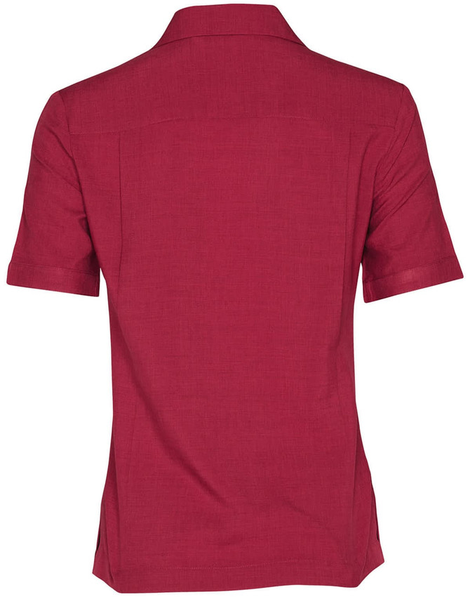 A red short sleeve overblouse with a collared neckline and a textured fabric. It features a logo on the back.