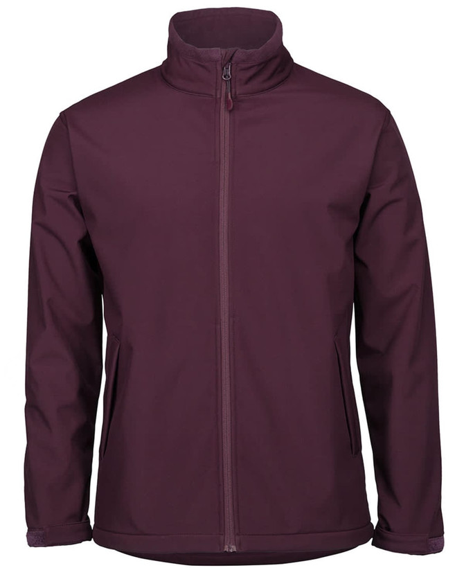 A maroon soft shell jacket with a high collar and side pockets, featuring branding on the front.