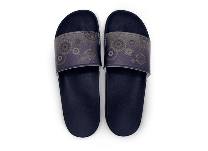 Navy slippers featuring a patterned strap with circular designs in shades of purple and gold.