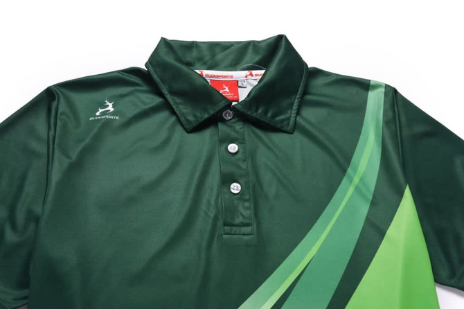 A green polo shirt featuring a curved green design and a logo on the chest. It has a classic collar and buttons.