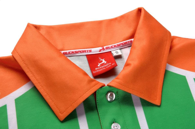 A green and orange badminton club uniform featuring a polo design and a tag with a logo.