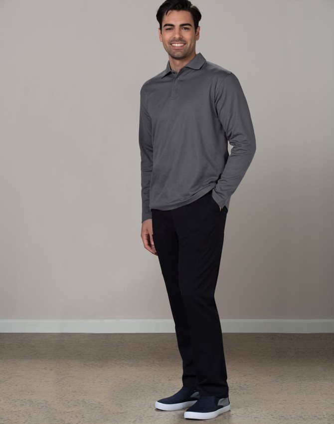 A man wearing a grey long-sleeve polo and black utility cargo pants, standing against a neutral background.