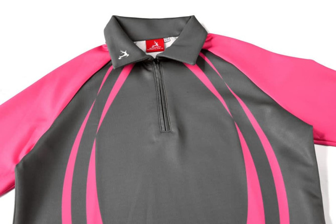 A polo shirt featuring a grey body with pink sleeves and stripes, designed with a collar and a zip.