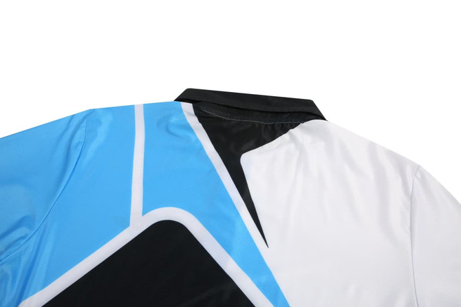 A polo shirt featuring a black collar and a vibrant design in blue, white, and black on the back.