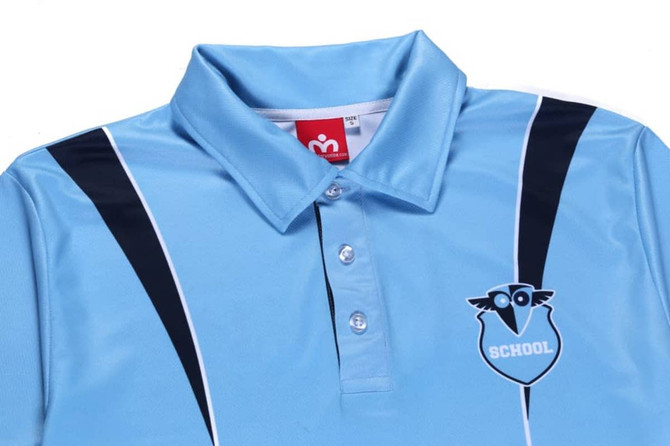 A light blue polo shirt featuring a logo and striped design in navy blue. It has a classic collar and buttons.