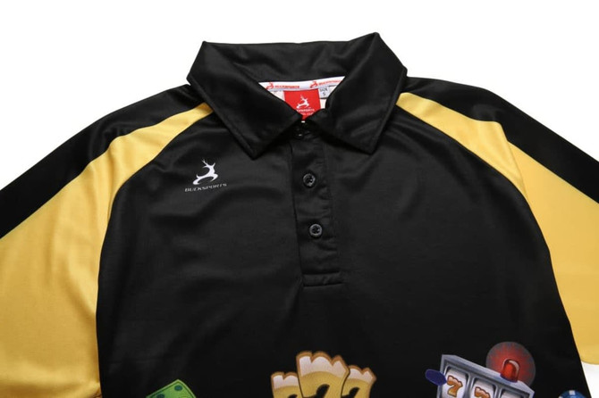 A black and yellow polo shirt featuring various graphic designs and a logo on the chest.