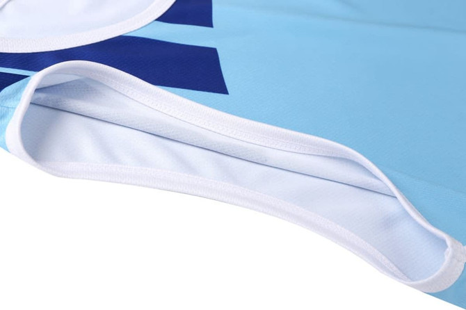 A lightweight singlet in blue with a white trim and printed design. The fabric is smooth and stretchy.