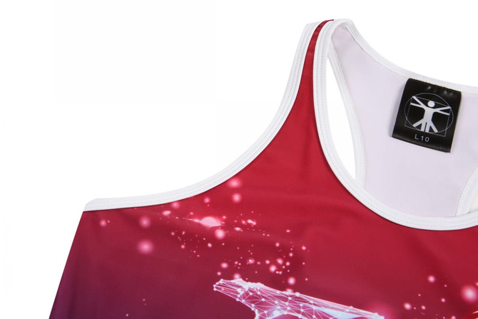 A women's running suit in red with a geometric design and a logo on the upper left.