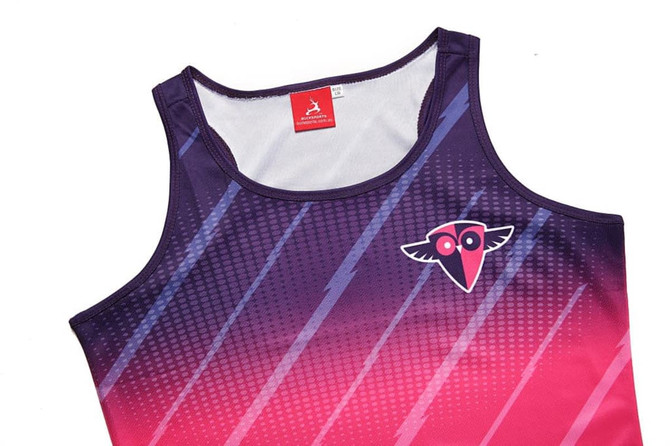 A narrow back women’s vest featuring a gradient design in purple and pink with a logo on the front.