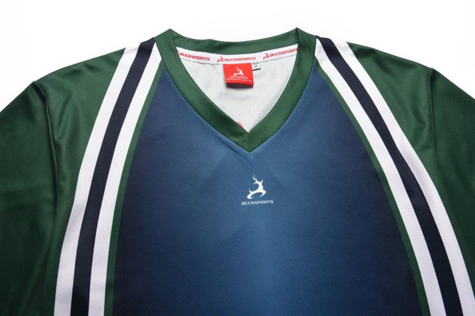 A green and blue polo shirt featuring white and black stripes, with a logo on the front.
