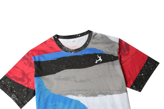 A multicoloured cotton tee featuring abstract patterns and a logo on the front.