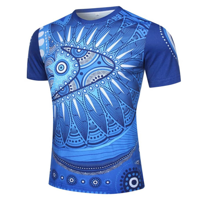 A blue Aboriginal cotton T-shirt featuring intricate patterns and designs, with a logo. Perfect for casual wear.