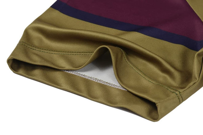 A striped tee in olive green, burgundy, and navy, featuring a folded hem and visible stitching detail.