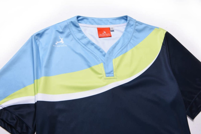 A polo shirt featuring a blue, lime green, and navy design, with a small logo on the upper left side.