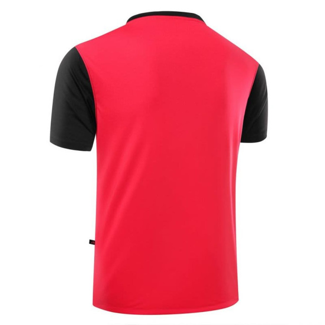 A red and black T-shirt with short sleeves, featuring a solid back and contrasting sleeves. It has a branding logo.