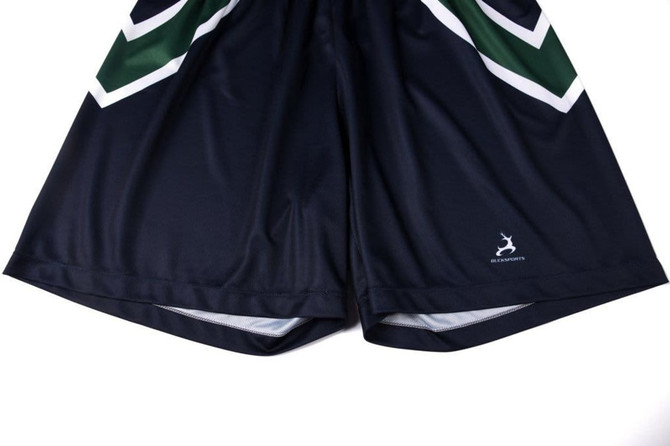 A pair of navy shorts with green and white graphic detailing, featuring a logo on the lower hem.