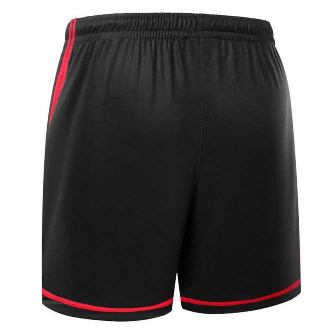 Black soccer shorts with red detailing, featuring an elastic waistband and a logo on the side.