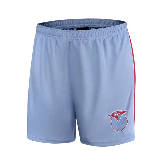 Light blue school shorts with a red side stripe and a logo on the front. Made from cotton with a comfortable fit.