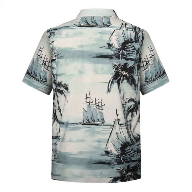 A short-sleeved shirt featuring a blue and cream pattern with ships and palm trees on a light background.