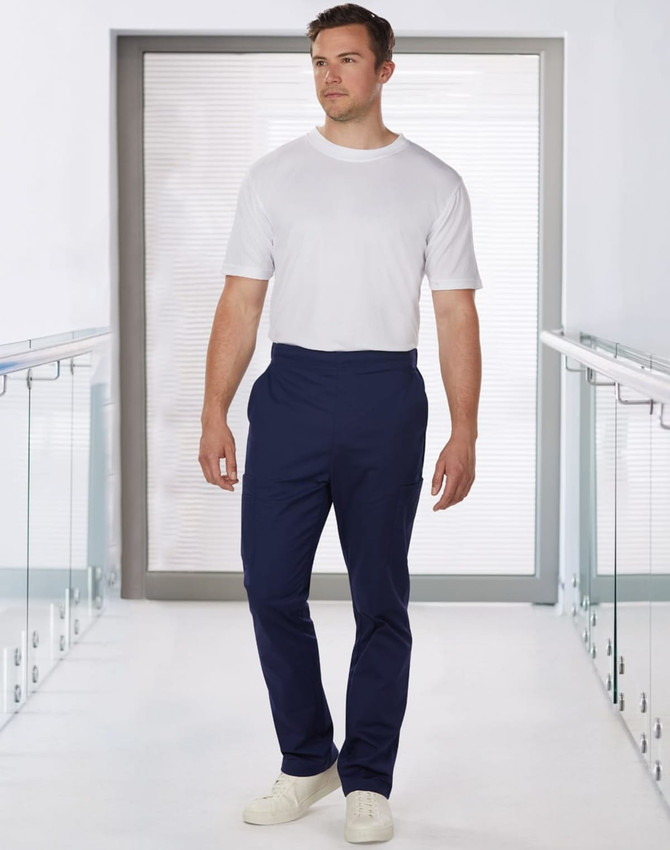Men's solid navy scrub pants displayed on a model wearing a white shirt, featuring a sleek design and a logo.