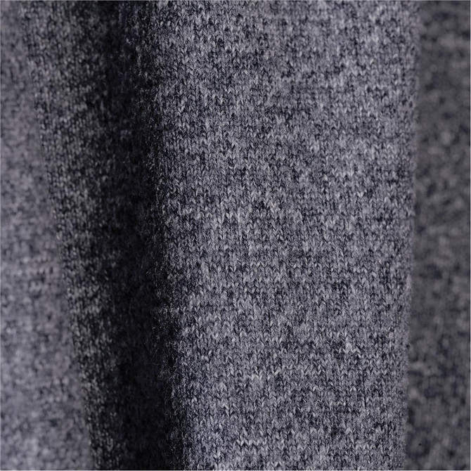 A close-up of grey, textured fabric, featuring a soft knit pattern. The material is suitable for casual wear.