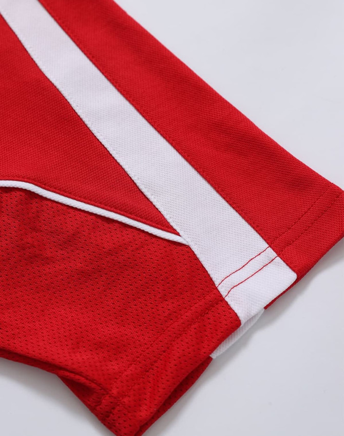 A red polo shirt with white accents on the sleeves. Features a logo on the fabric.