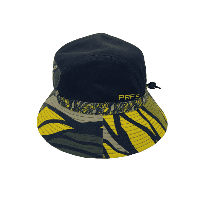 A soft cap featuring a dark navy top and a vibrant yellow and green patterned brim, with a logo on the side.