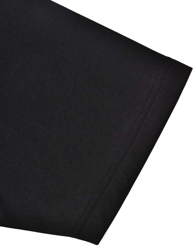 A close-up of a black polo shirt sleeve, featuring contrasting stitching and a small logo.