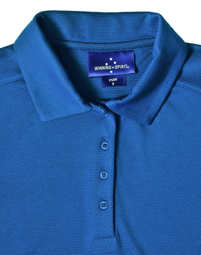 A blue polo shirt featuring a collar, buttons, and a brand label on the inside.