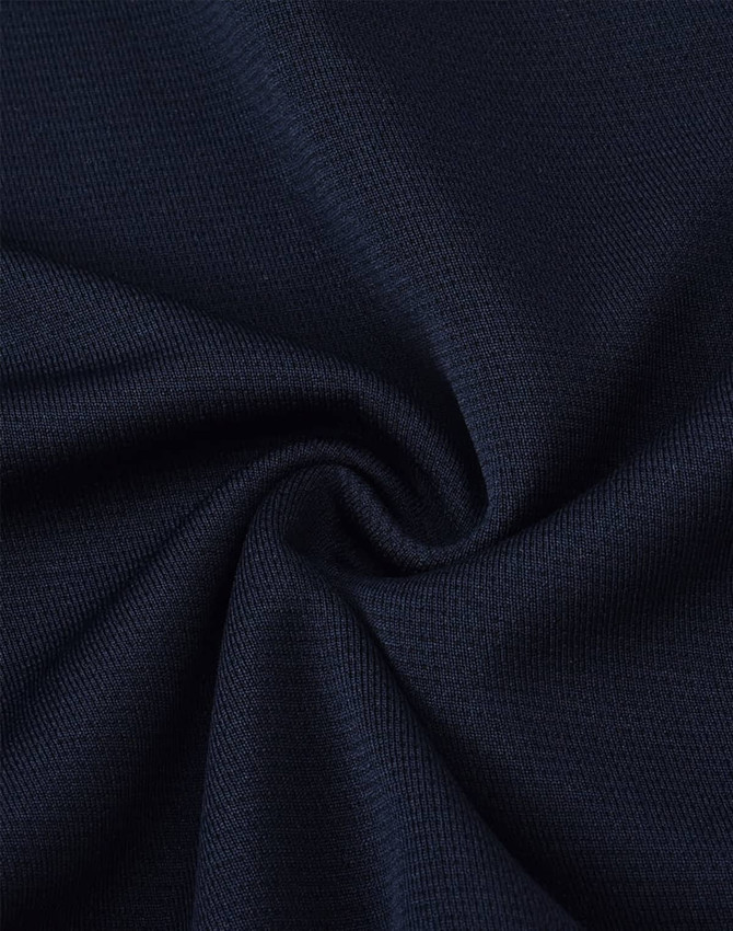 A close-up of navy fabric, featuring a smooth, textured finish, suitable for adults' sports shorts.