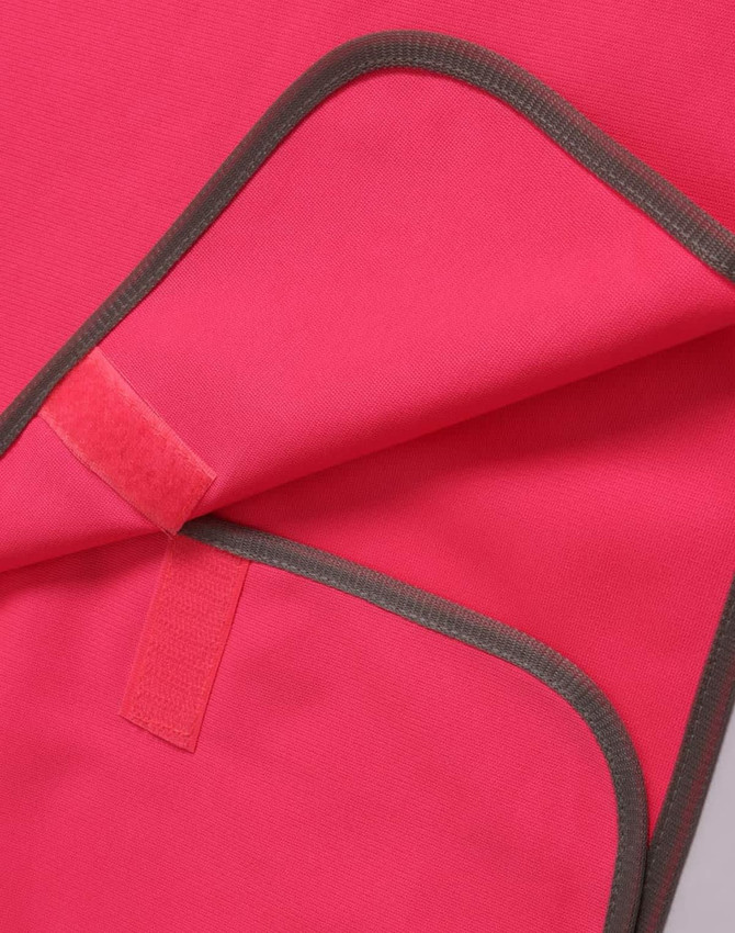 A bright pink safety vest with contrasting grey trim and a Velcro closure. It features a logo on the fabric.