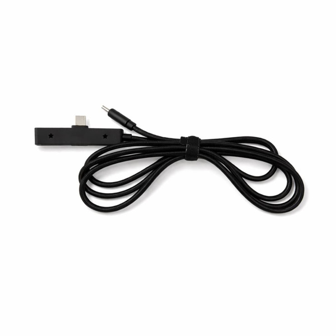 A black charging cable featuring a USB connector and a rounded end, neatly coiled for easy storage.