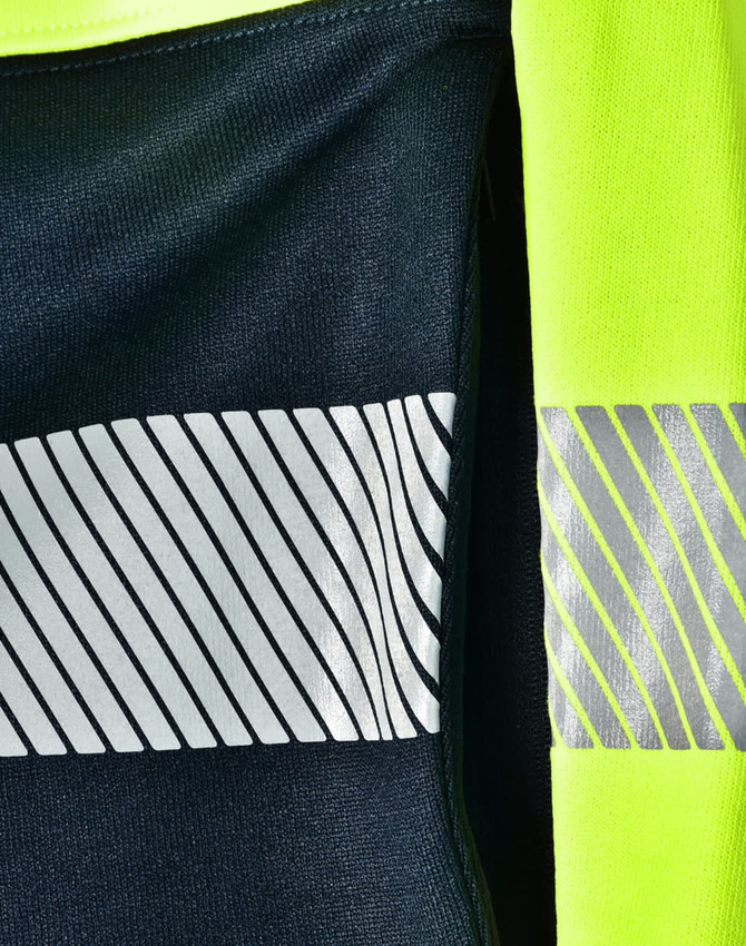 A navy jumper with reflective stripes and high visibility yellow accents, featuring a logo.