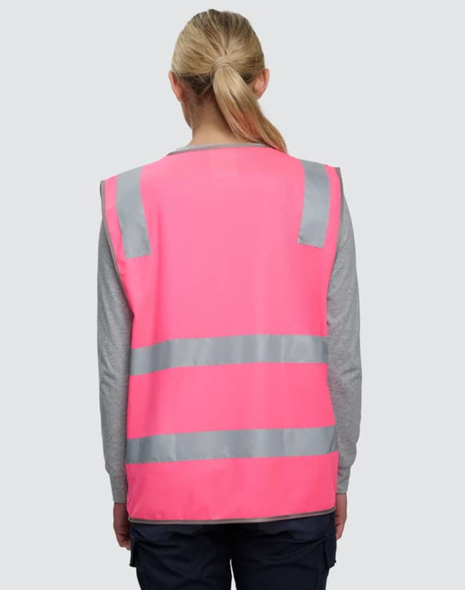 A pink safety vest featuring grey reflective stripes and a logo. Ideal for high-visibility safety wear.