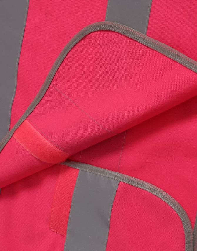 A high visibility safety vest in pink with grey shoulder reflective tapes, featuring a trim along the edges.