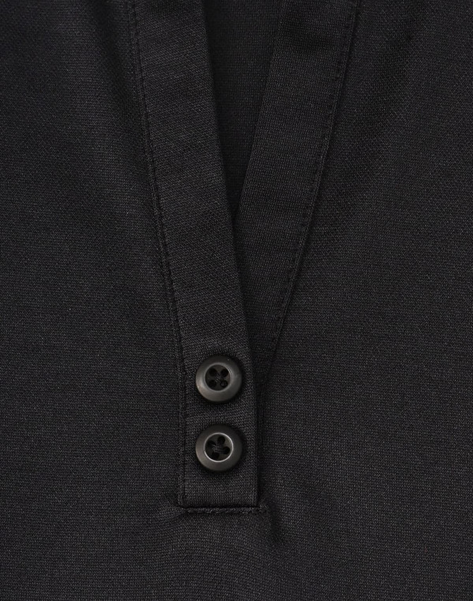 A close-up of a black polo shirt featuring a collar and two buttons at the neckline. The shirt has a logo.