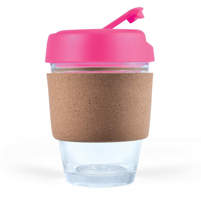 A reusable coffee cup with a transparent body, pink lid, and a cork band around the middle.