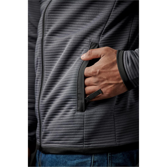 A grey Men's Andorra Jacket featuring a textured fabric and side pocket. It has a logo on the sleeve.