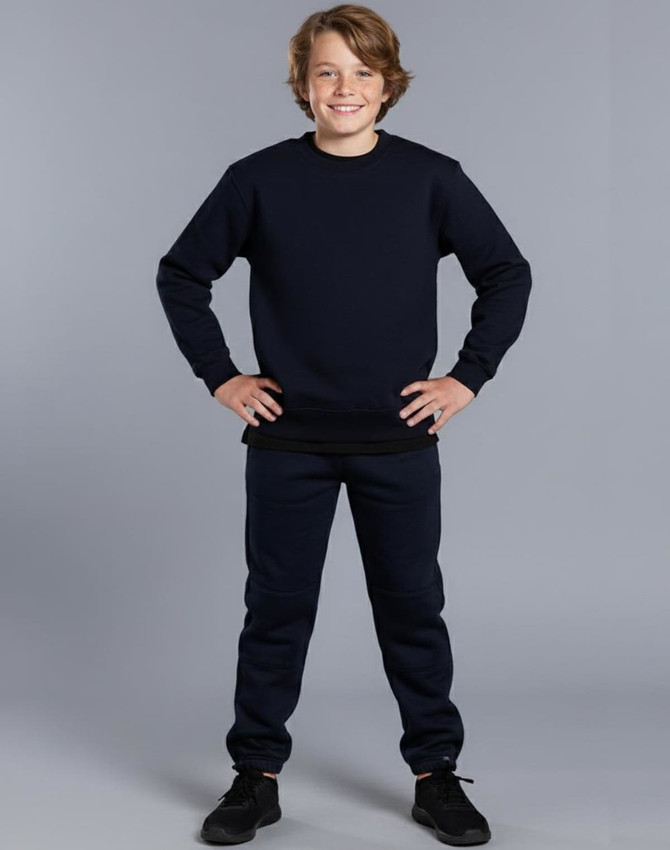 Kid's black fleecy trackpants with zip, cuffs, knee padding, and pockets, featuring a logo.