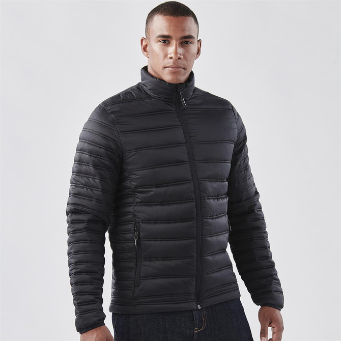 A men's thermal jacket in black, featuring a zip front, high collar, and a fitted design. It has a logo on it.
