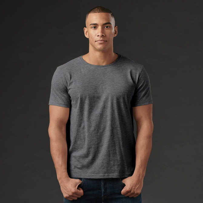 A grey crew neck t-shirt for men, featured on a model against a dark background. The shirt has a simple design.