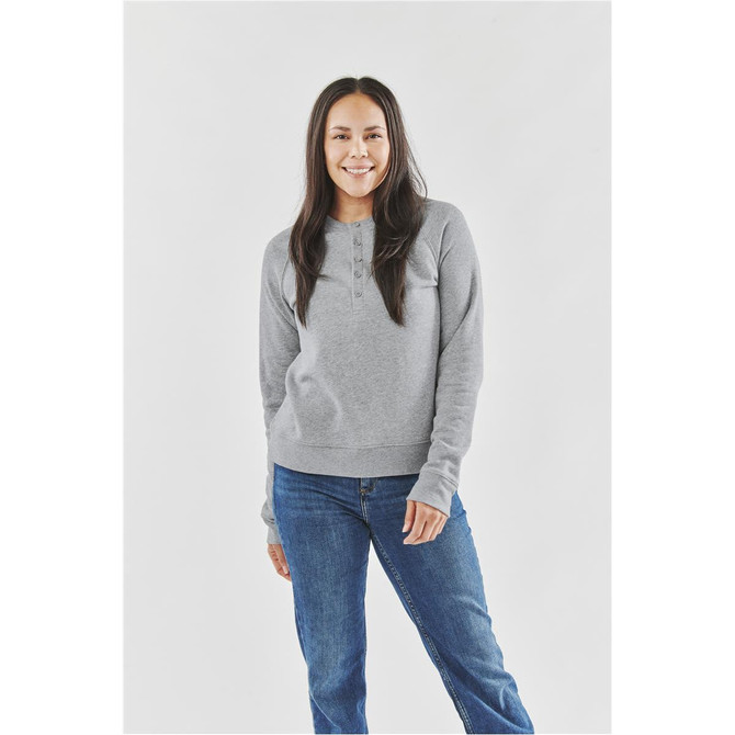 A grey women's henley shirt with long sleeves, featuring a simple design and a logo on the chest.