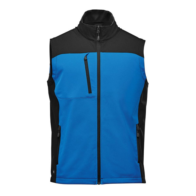 A softshell vest in blue and black, featuring zippered pockets and a high collar, with a logo on the front.