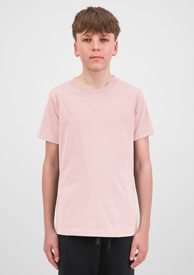 A plain pink short sleeve tee displayed on a model against a neutral background. The shirt has a logo.