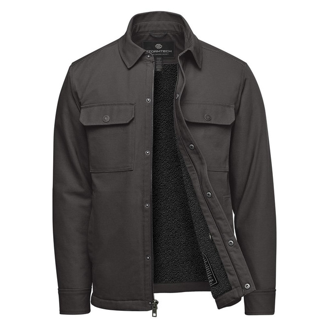 A men's oxford grey jacket with a sherpa lining, featuring two chest pockets and a zip-front opening.