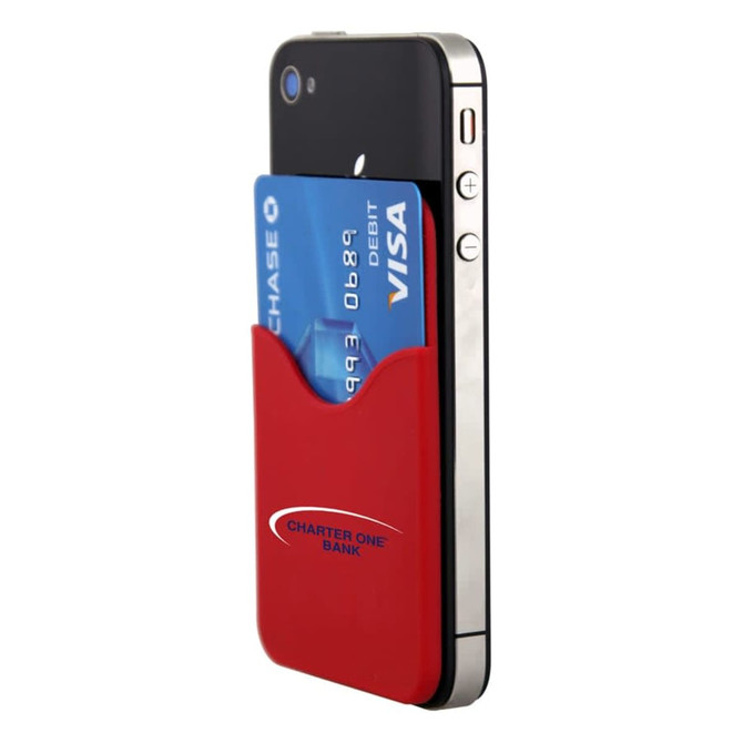 A red Smart Wallet attached to a smartphone, holding a blue credit/debit card. The product has a logo.